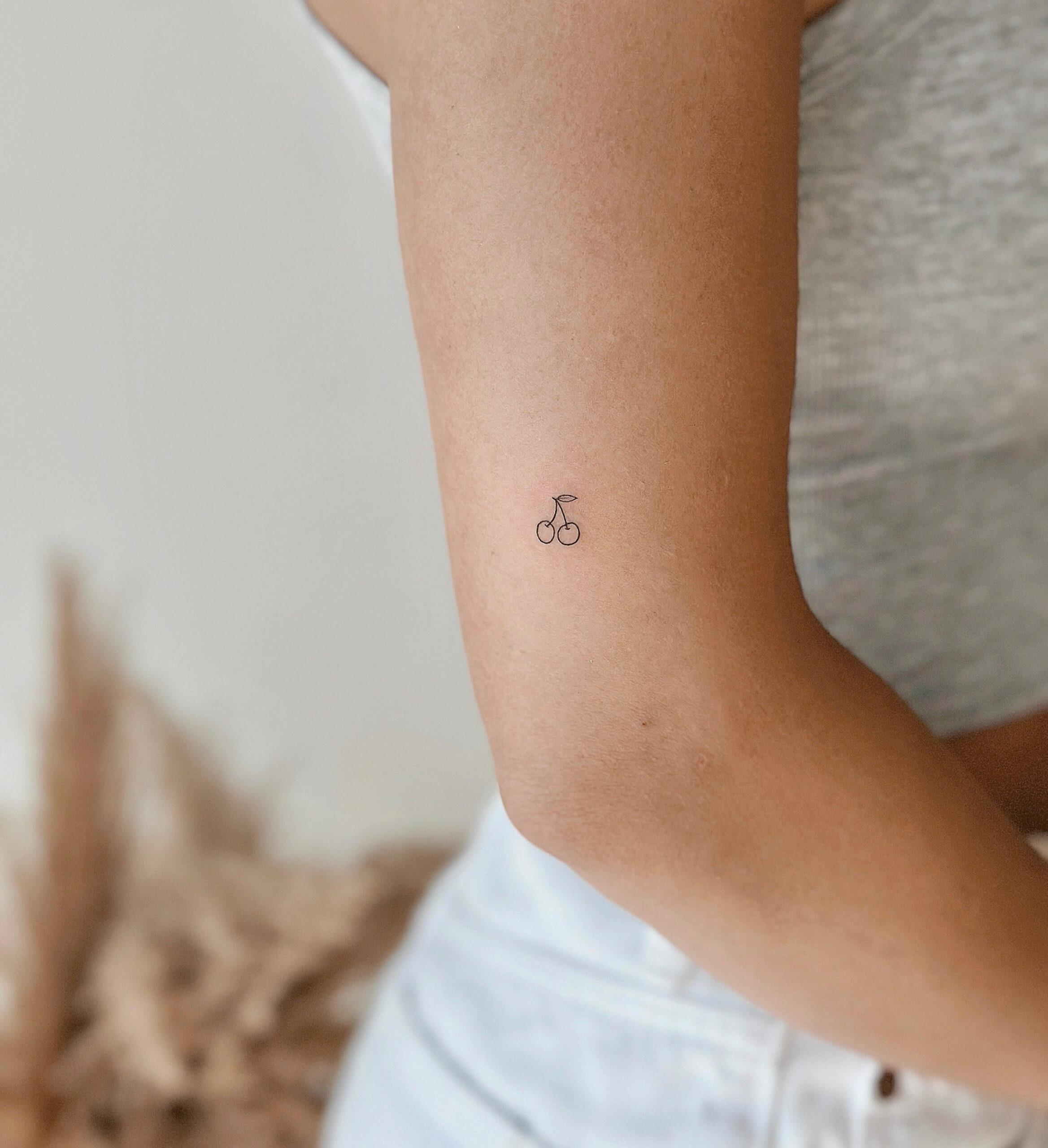 Fine line cherry tattoo