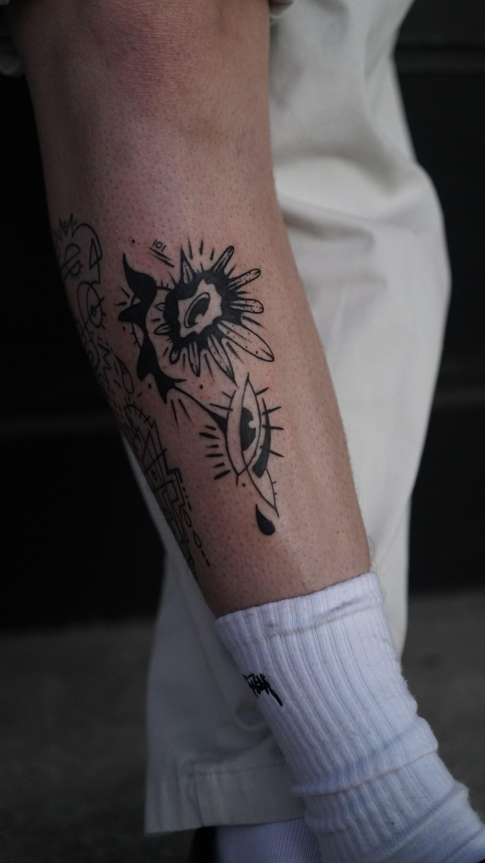 Abstract eye tattoo