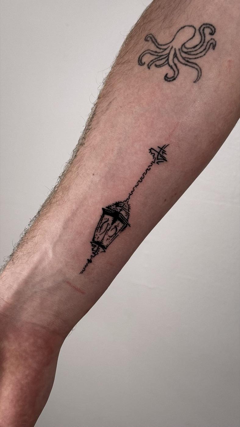 Fine line lantern tattoo
