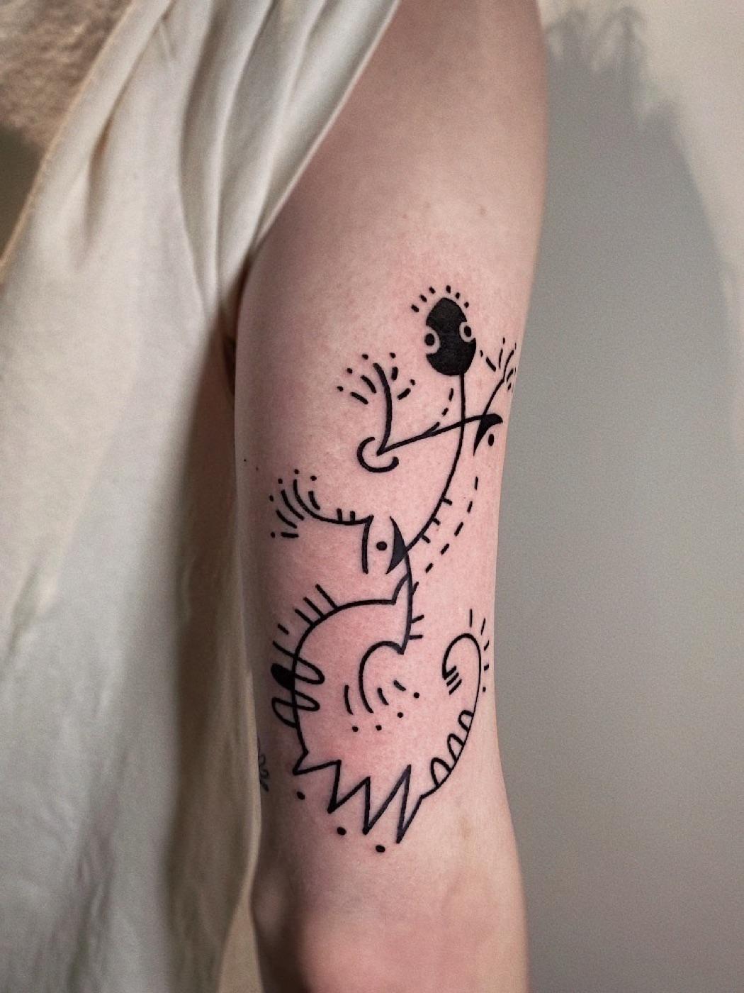 Graphic linework tattoo