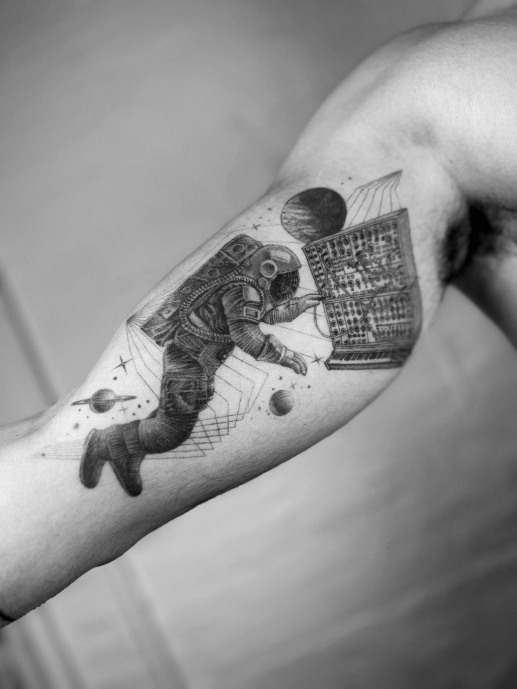 Astronaut and synth tattoo