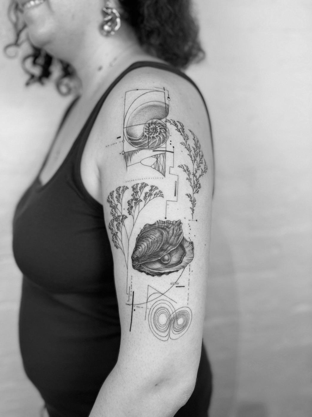 Nautilus shell tattoo