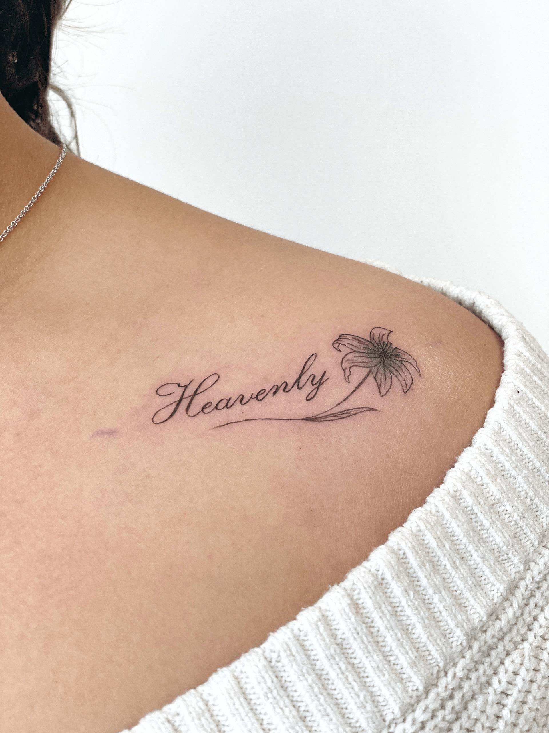 Fine line floral script tattoo