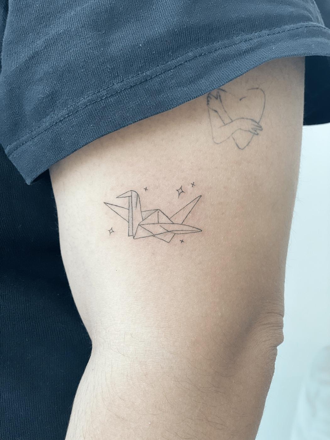 Origami crane tattoo
