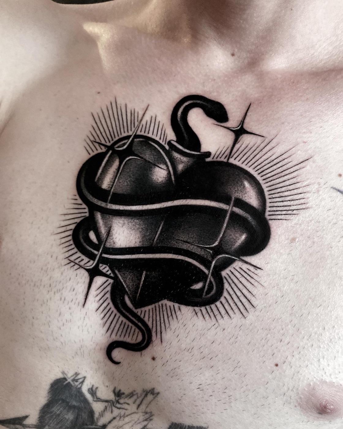 Snake and heart tattoo