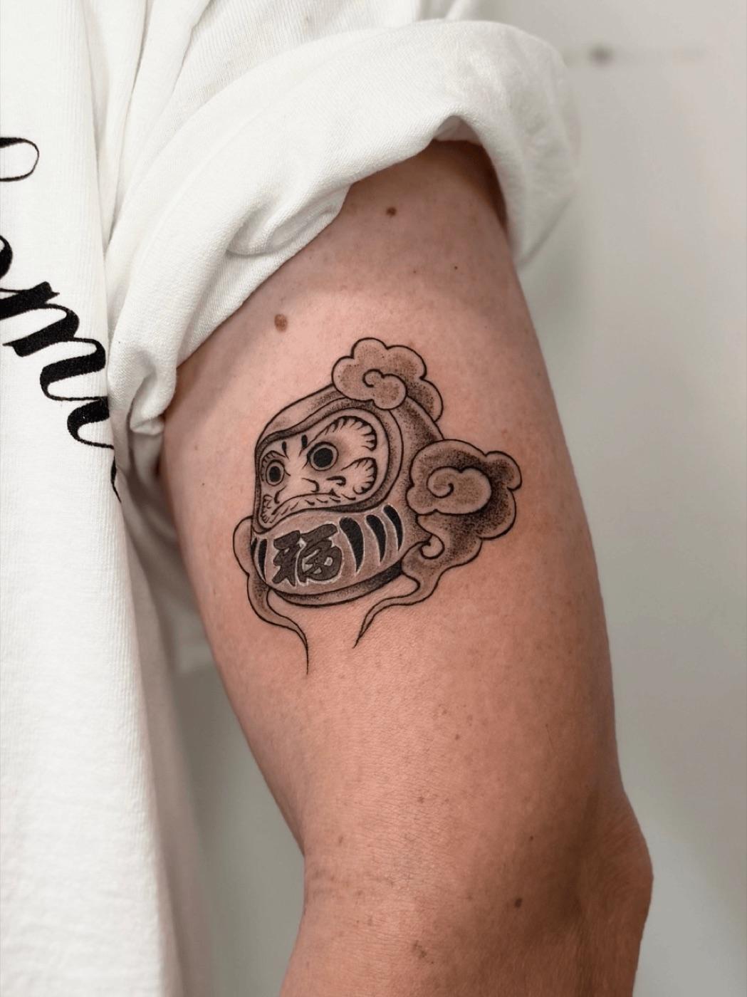 Japanese daruma doll tattoo