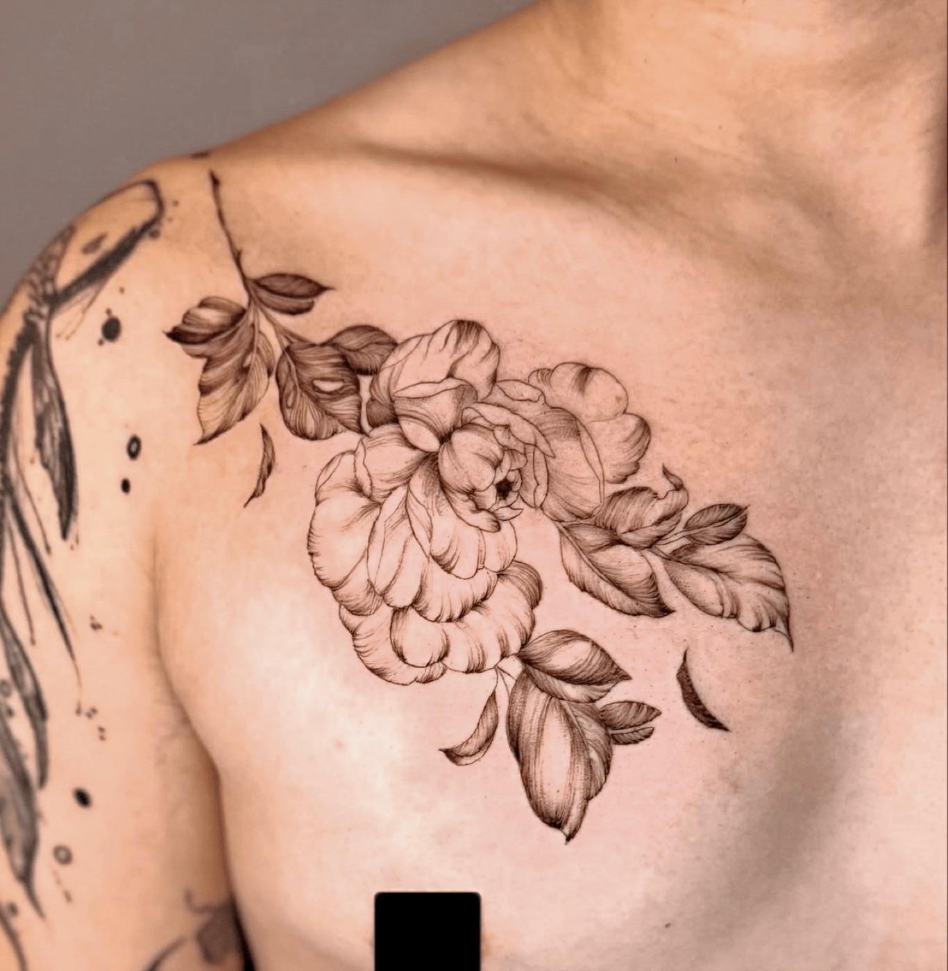 Black and grey floral tattoo