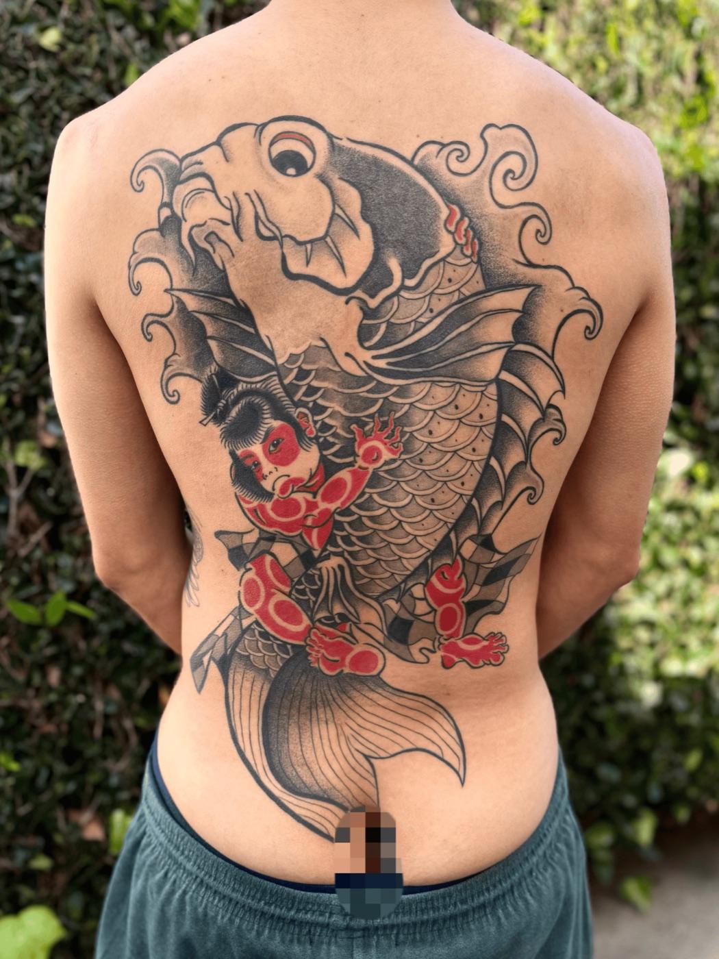 Japanese koi back tattoo