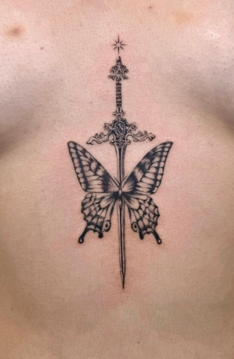 Dagger and butterfly tattoo