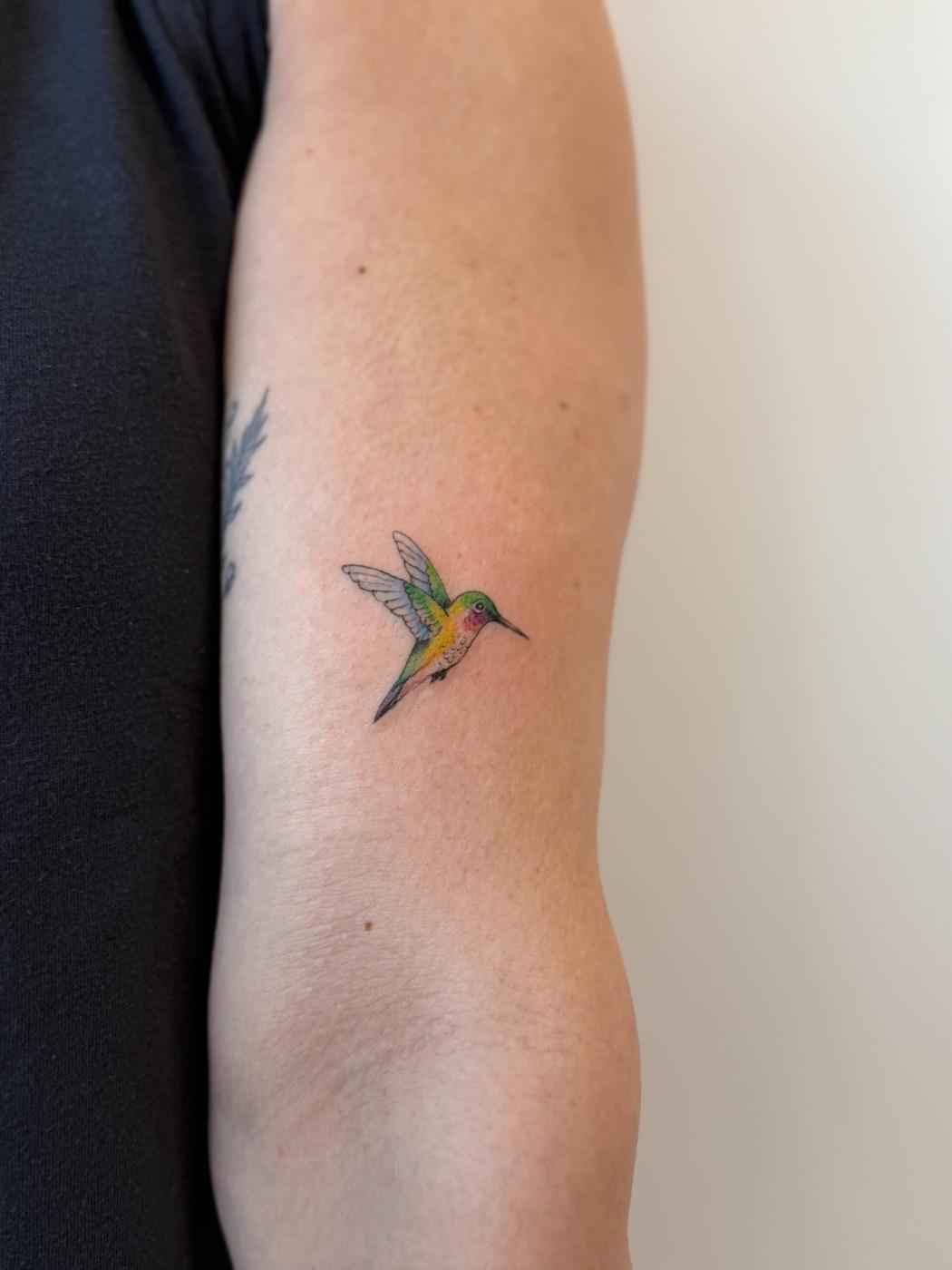 Realistic hummingbird tattoo