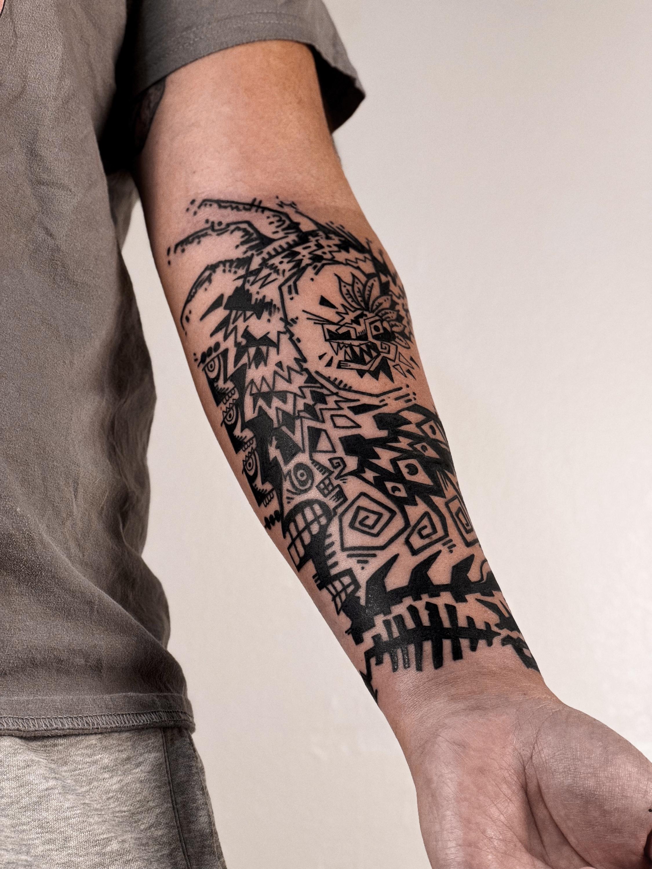 Black and grey abstract blackwork tattoo