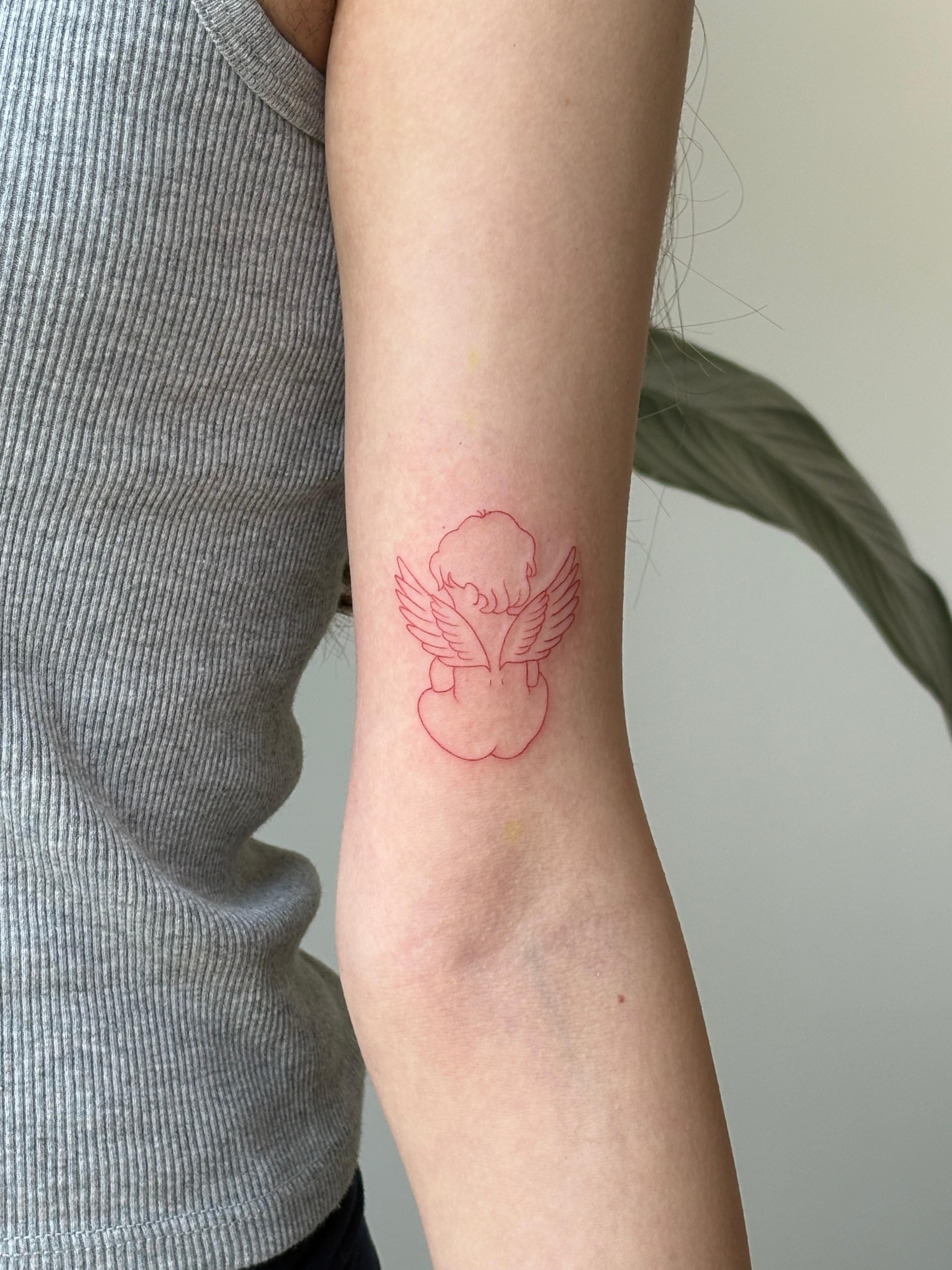 Red outline angel tattoo
