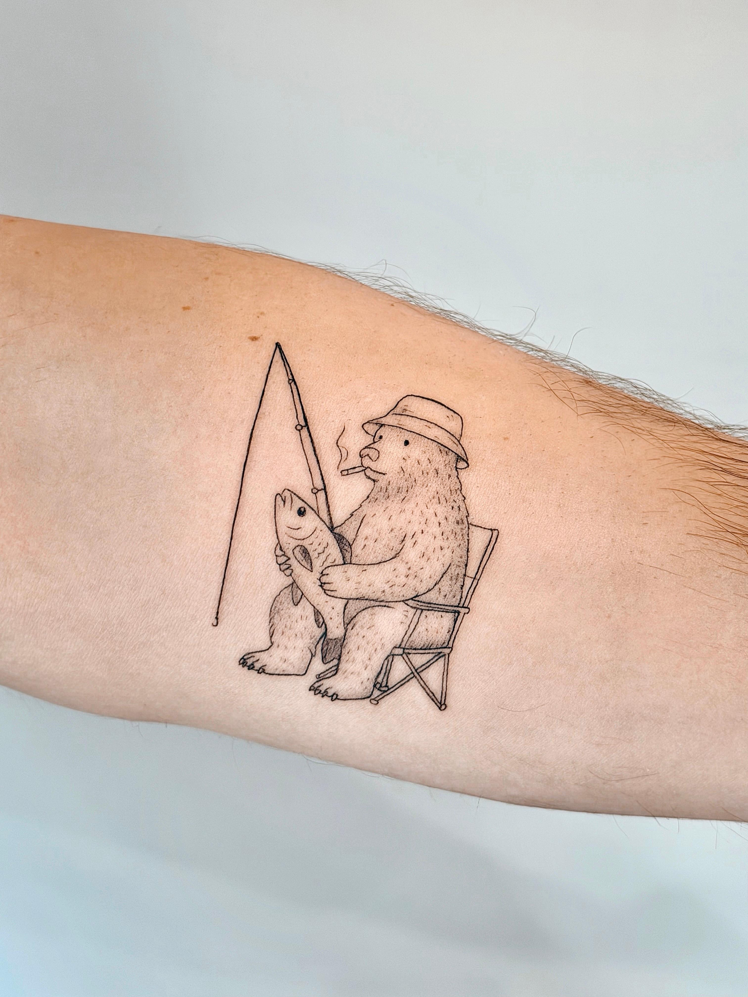 Fine line bear fishing tattoo