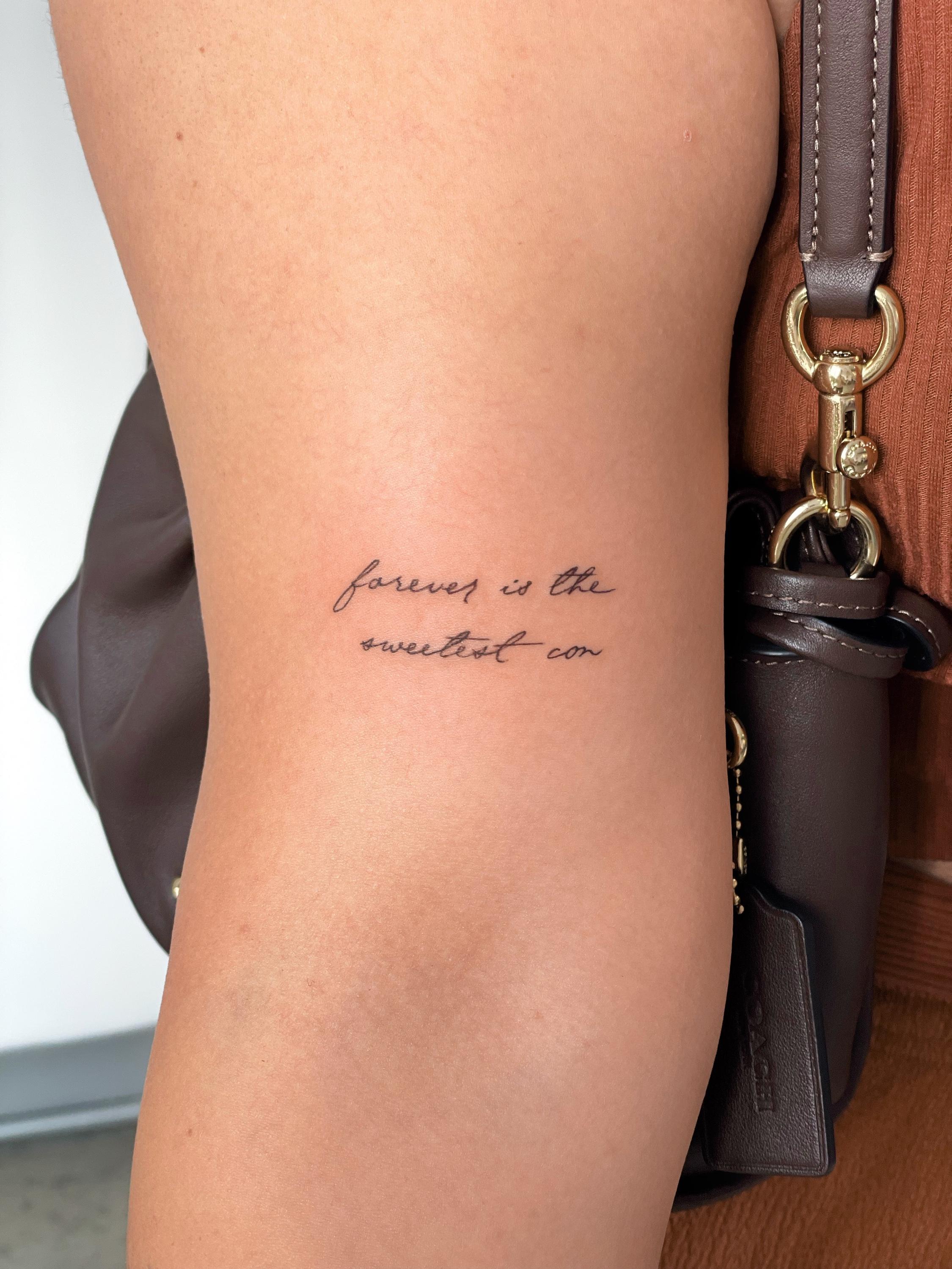 Script tattoo reading forever is the sweetest con